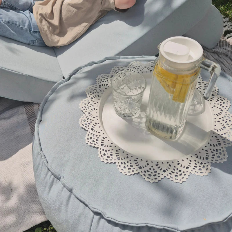Coussin de sol rond d'extérieur en toile déperlante et résistante aux UV Outzy