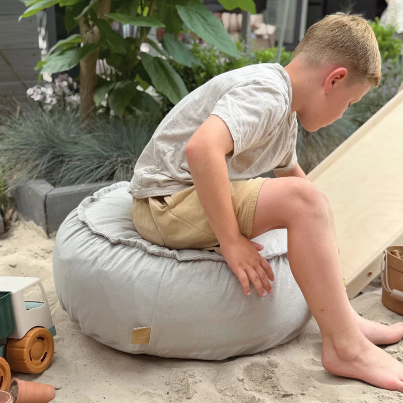 Coussin de sol rond d'extérieur en toile déperlante et résistante aux UV Outzy