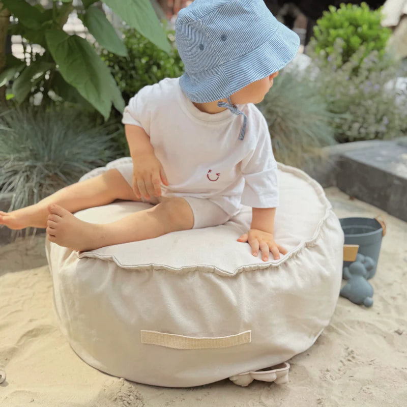 Coussin de sol rond d'extérieur en toile déperlante et résistante aux UV Outzy