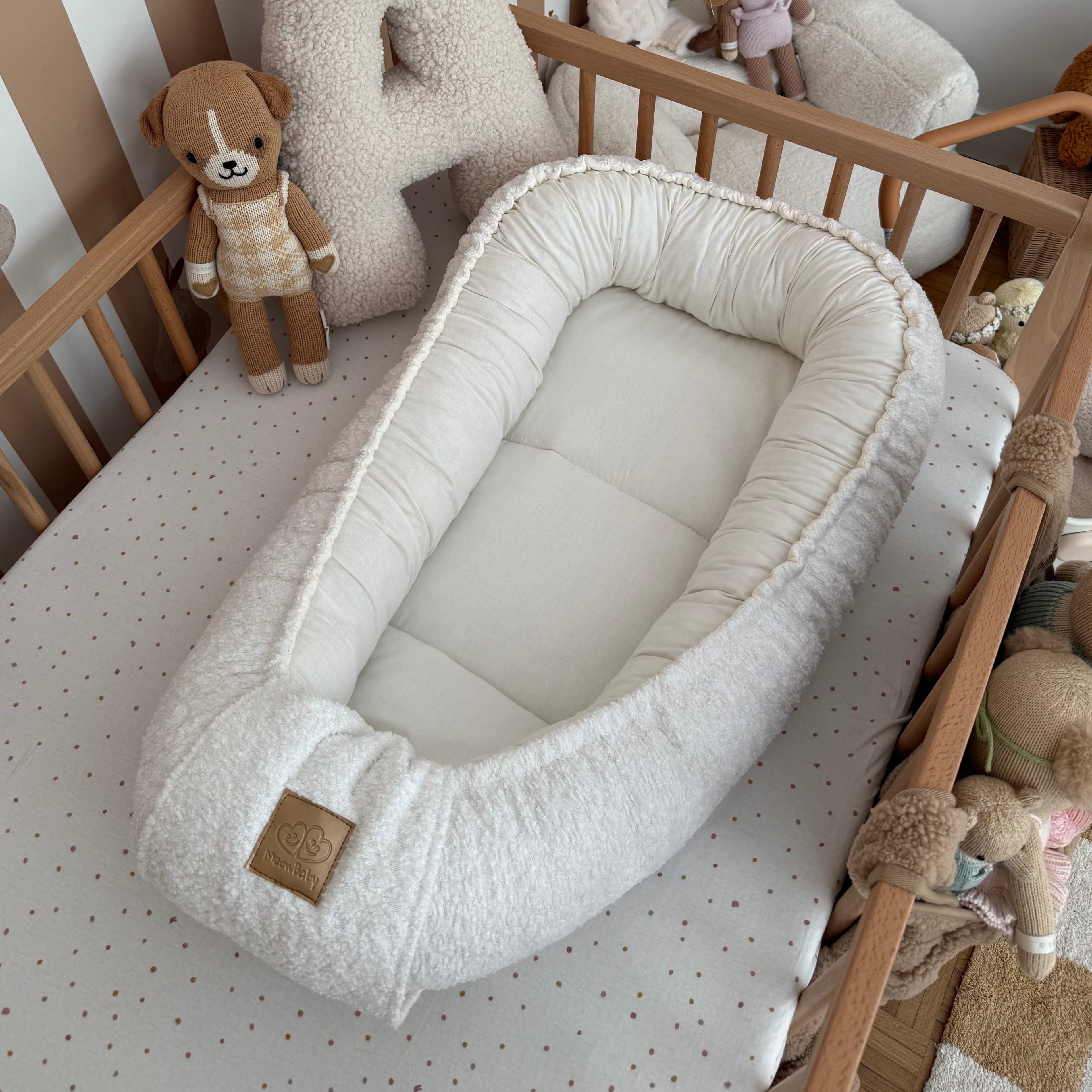 Nid d'ange, réducteur de lit pour bébé en tissu texturé bouclé