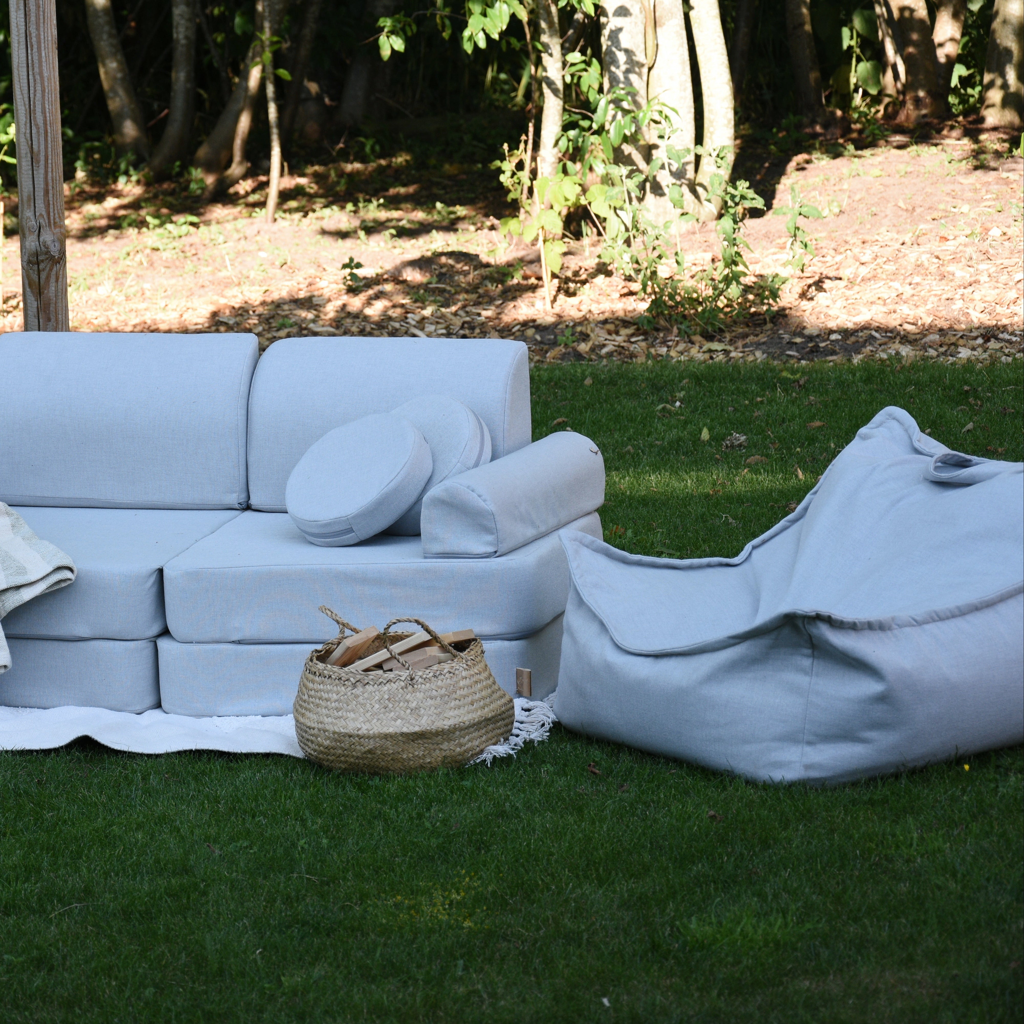 Coussin de sol rond d'extérieur en toile déperlante et résistante aux UV Outzy