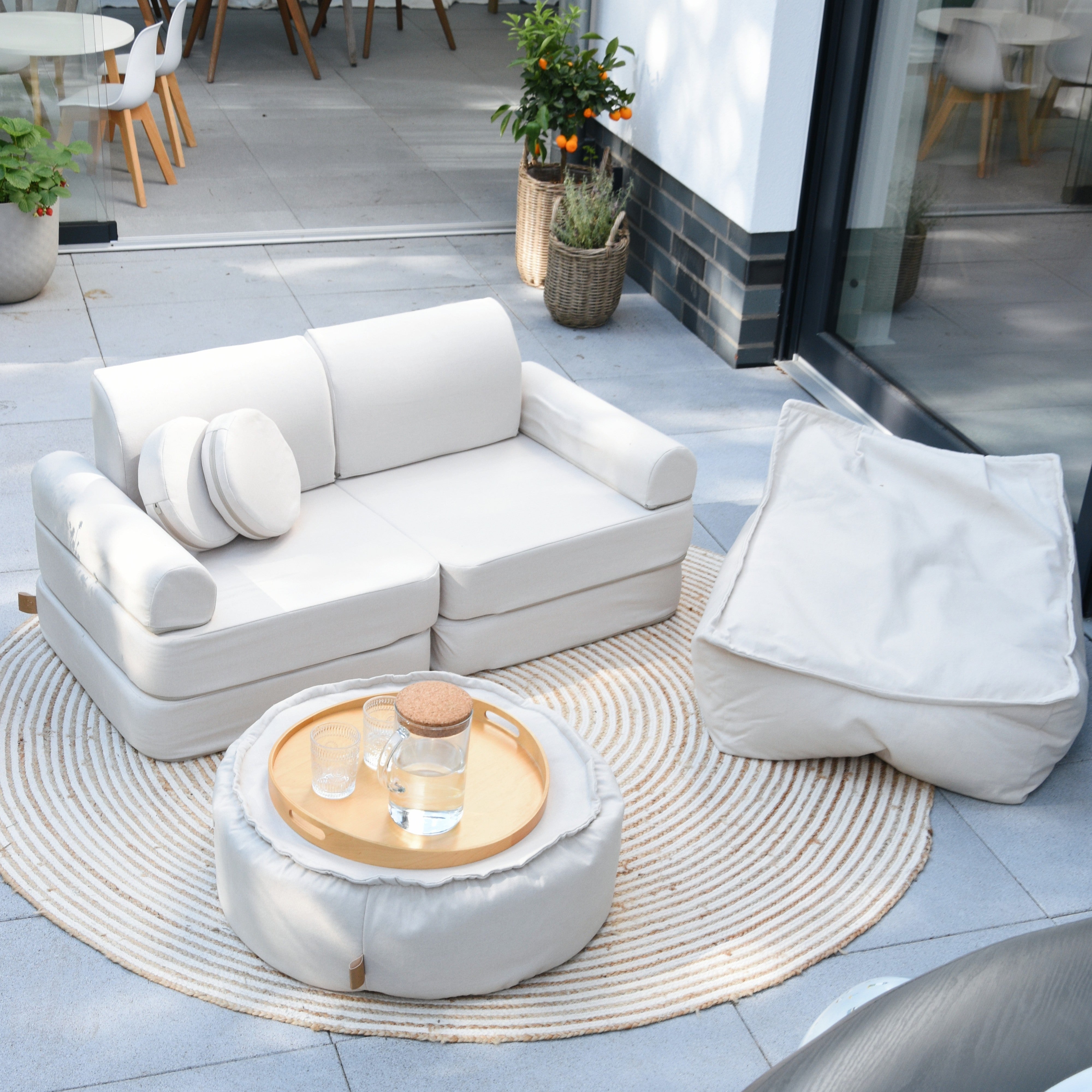 Pouf carré d'extérieur en toile déperlante et résistante aux UV Outzy