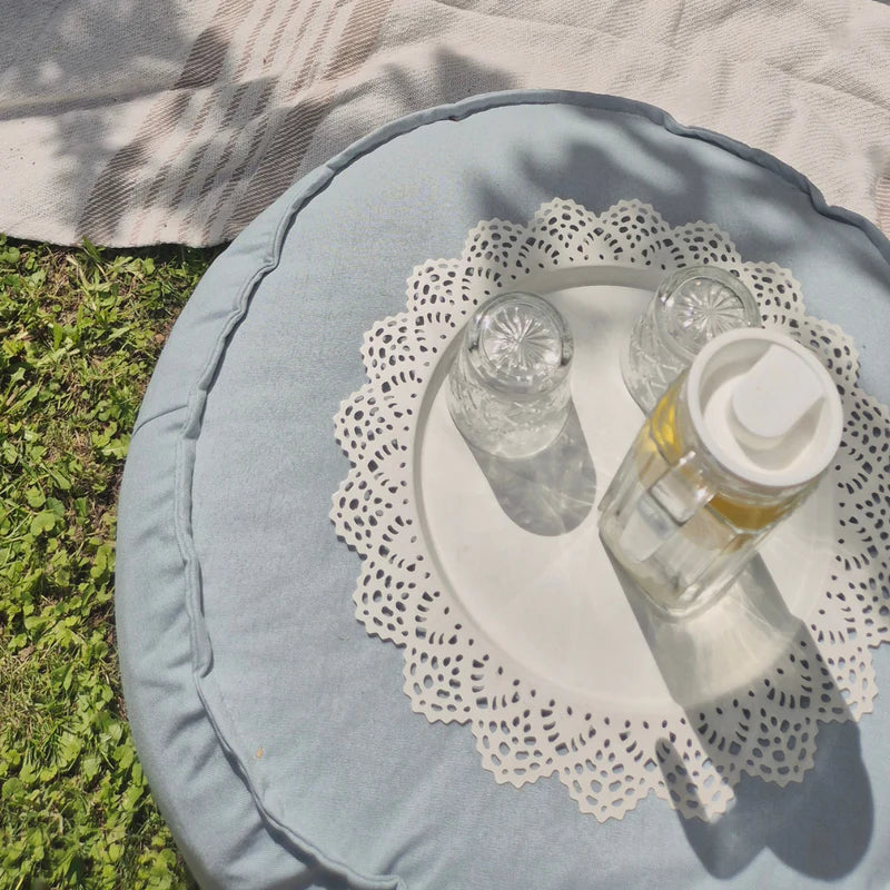 Coussin de sol rond d'extérieur en toile déperlante et résistante aux UV Outzy