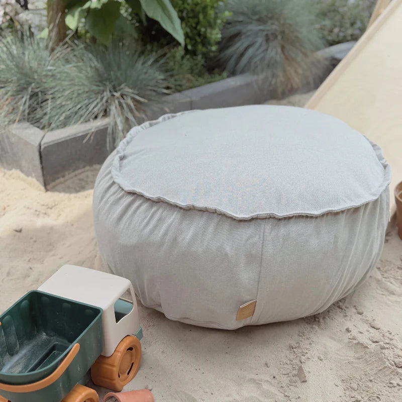 Coussin de sol rond d'extérieur en toile déperlante et résistante aux UV Outzy