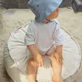 Coussin de sol rond d'extérieur en toile déperlante et résistante aux UV Outzy