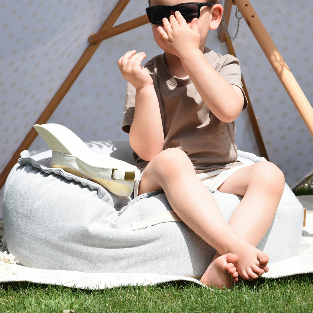 Coussin de sol rond d'extérieur en toile déperlante et résistante aux UV Outzy