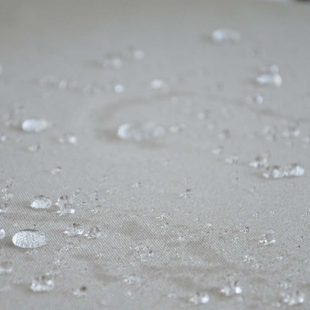 Pouf carré d'extérieur en toile déperlante et résistante aux UV Outzy