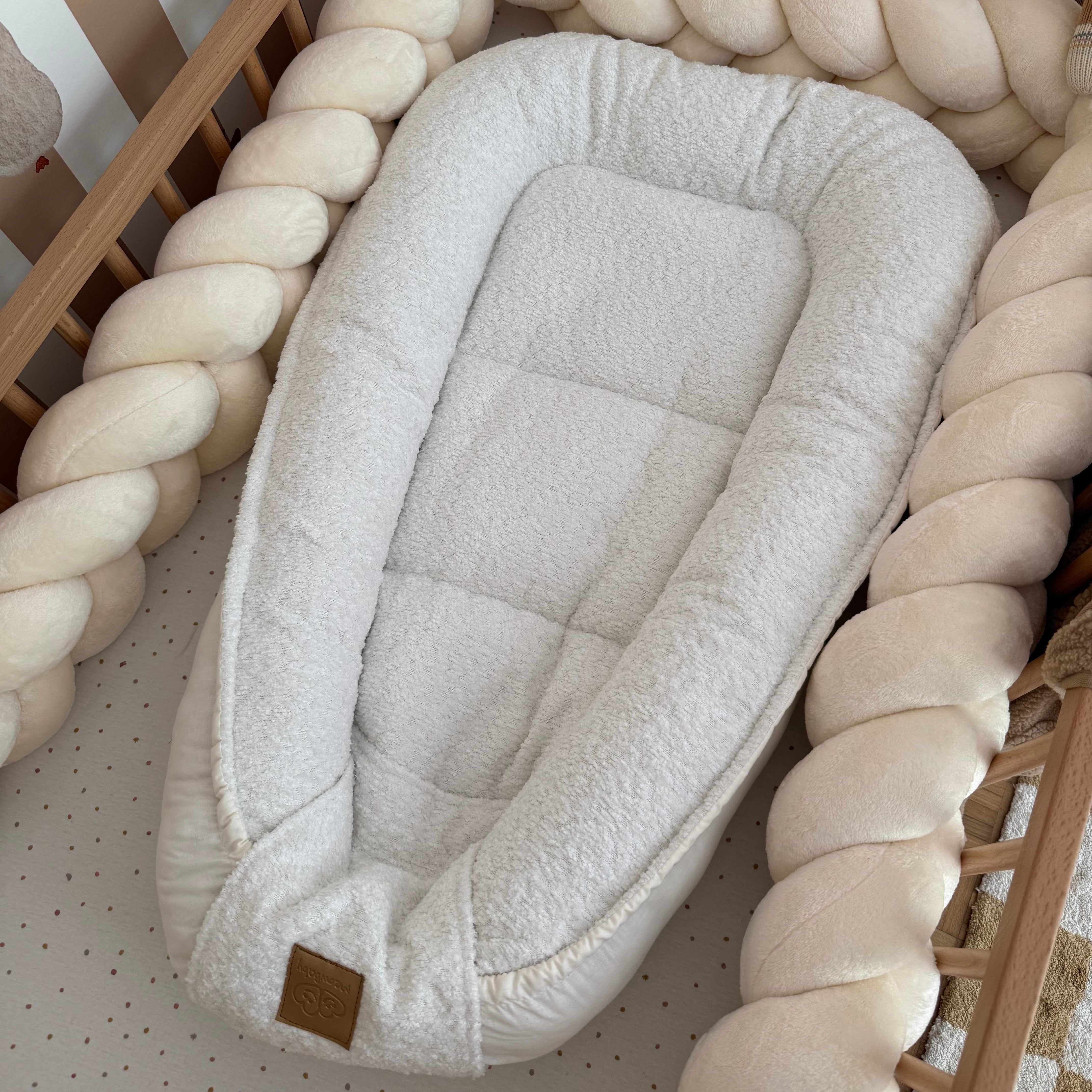 Nid d'ange, réducteur de lit pour bébé en tissu texturé bouclé