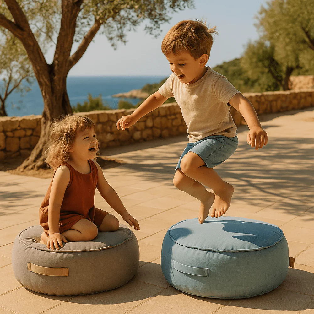 Coussin de sol rond d'extérieur en toile imperméable et résistante aux UV Outzy